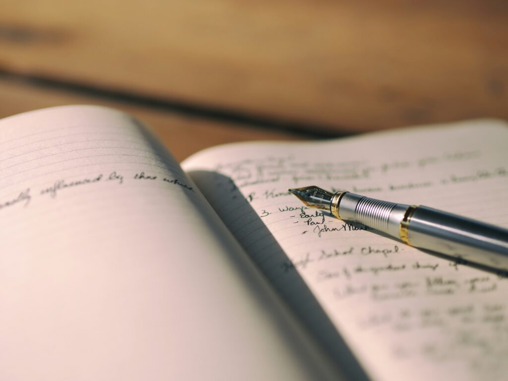 A journal and pen to record how you are feeling