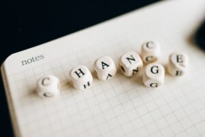 Letters making up the words chance and change depicting life coaching