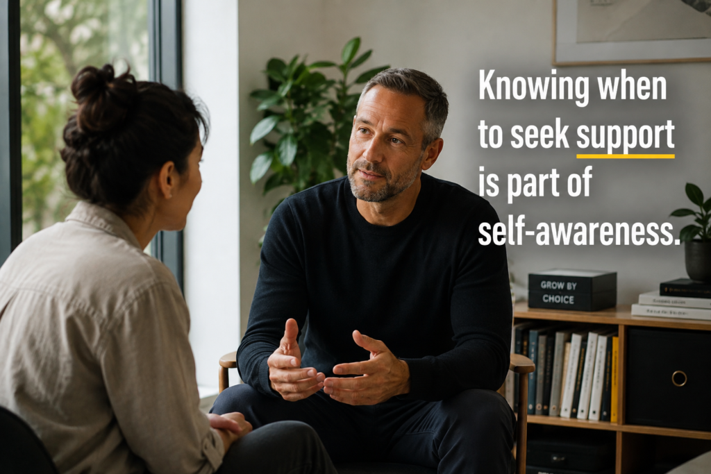 Two people having a supportive conversation, showing that self-coaching can include recognising when outside help is needed.