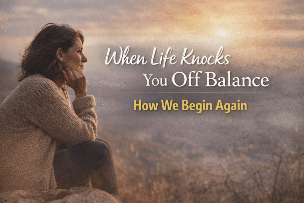 Woman sitting quietly in a reflective moment, representing finding stability after life knocks you off balance